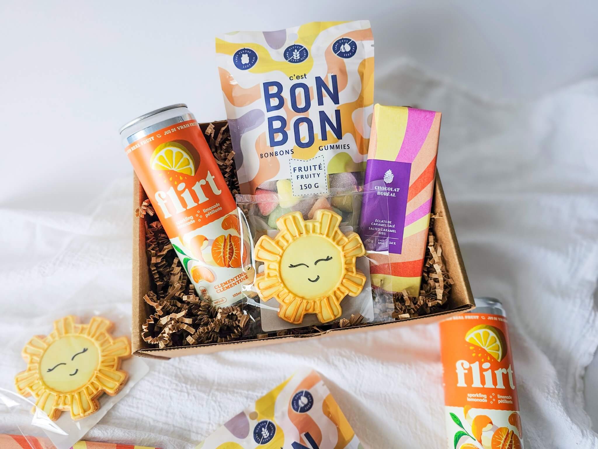 Boîte cadeau Rayon de soleil avec biscuit soleil, chocolat caramel et limonade clémentine québécoise
